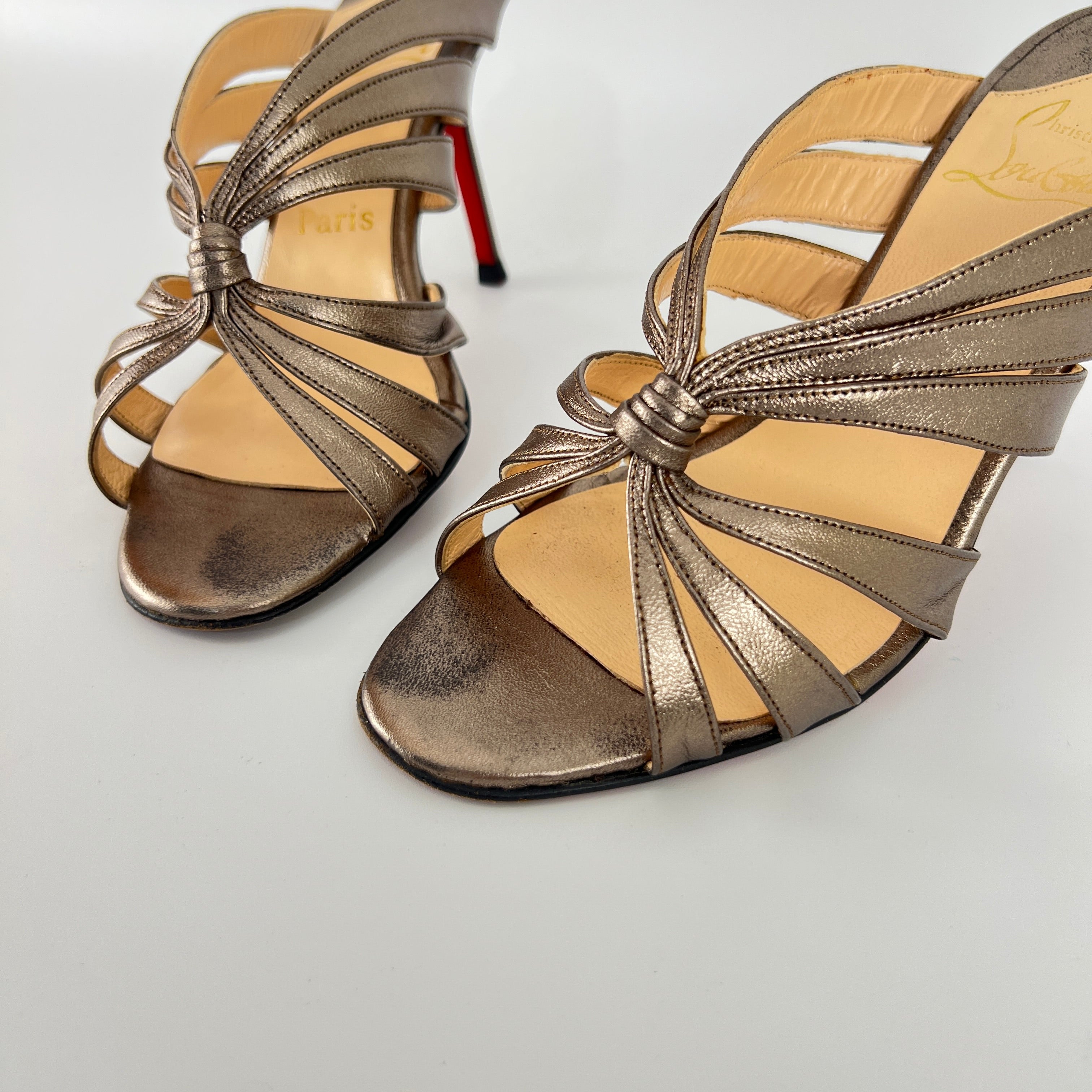 Louboutin | Rose Gold Metallic Leather Twist Strappy Sandal Mule Heels (36)