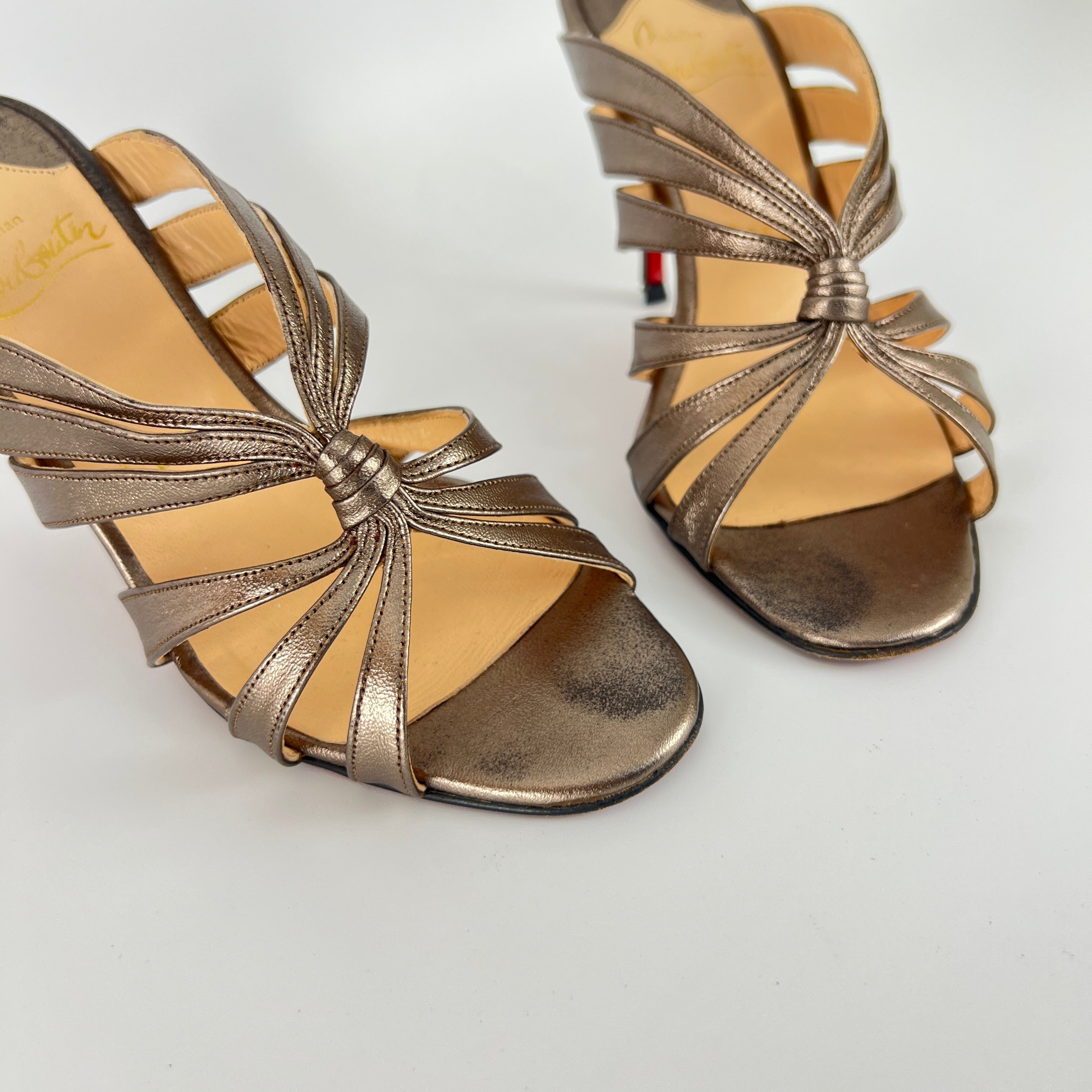 Louboutin | Rose Gold Metallic Leather Twist Strappy Sandal Mule Heels (36)