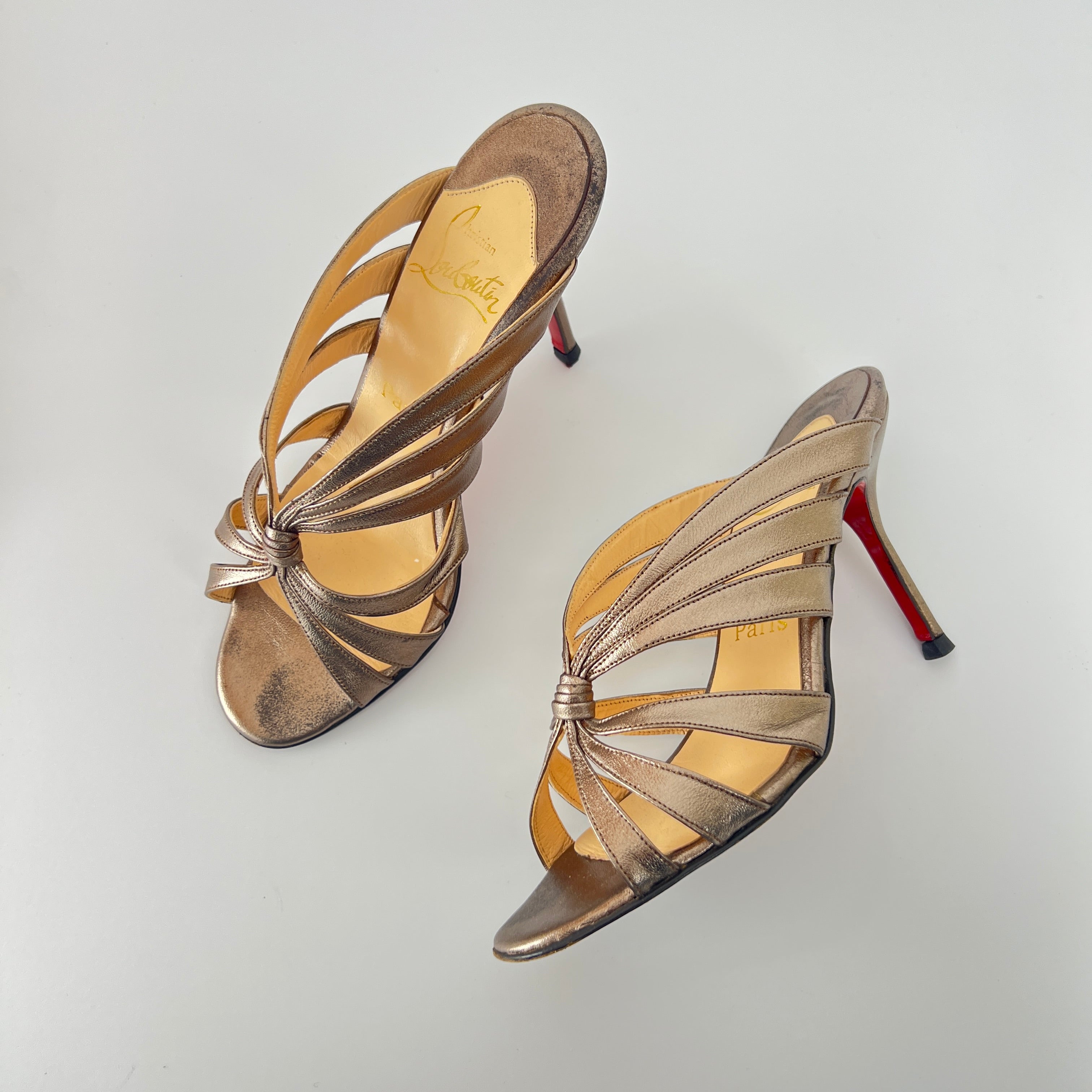 Louboutin | Rose Gold Metallic Leather Twist Strappy Sandal Mule Heels (36)